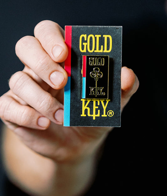 Enamel pin featuring the Gold Key Comics logo